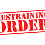 Massachusetts restraining order hearing defense attorney in court